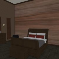Bedroom with sleigh bed frame, tall ceilings and sliding barn door.