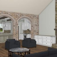 Open and bright living room with a fireplace and connected to the kitchen through arches.