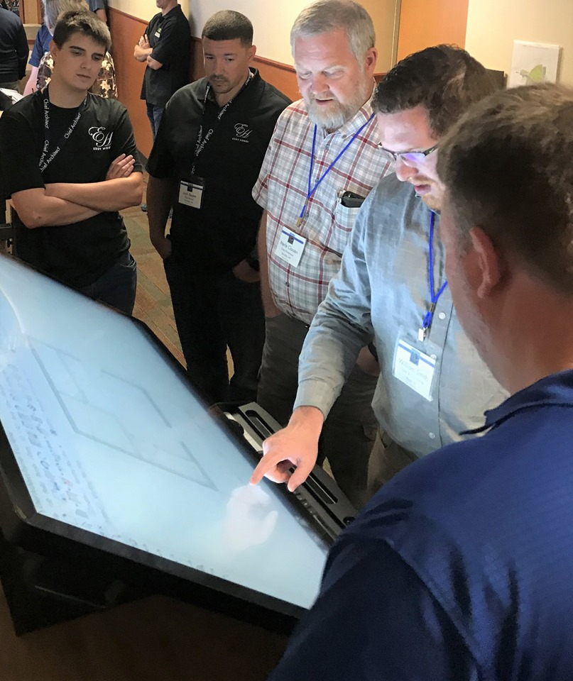 Group of people using computer to test out new features of Chief Architect Premier 