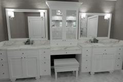 Bathroom with black vanity and brushed brass fixtures