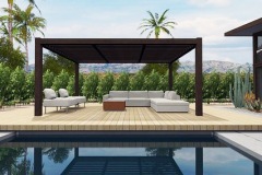 Residential design with a butterfly roof and a backyard breeze block.